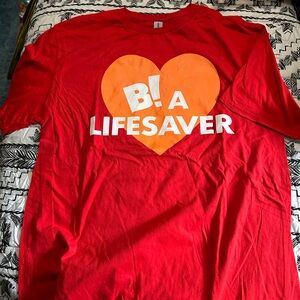 Red men’s size LG Shirt with Heart Design
New without tags
